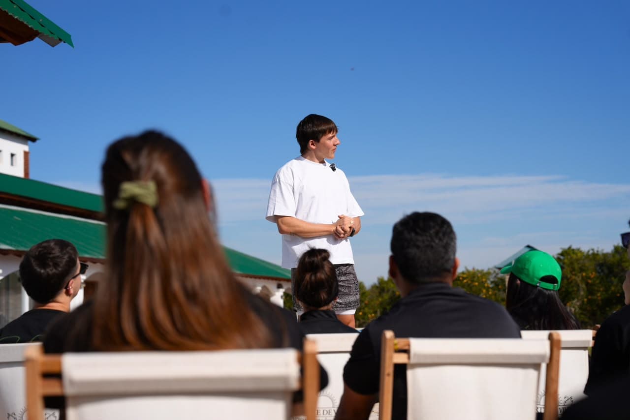Hari giving a talk at a wellness event